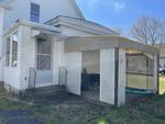 3BR Cape Home - .11+/- Acres Auction Photo