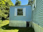 1981 Single-Wide Mobile Home - 2BD/2BTH w/Addition - Selling Home Only - Rented Park Lot Auction Photo