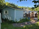 1981 Single-Wide Mobile Home - 2BD/2BTH w/Addition - Selling Home Only - Rented Park Lot Auction Photo