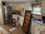 1981 Single-Wide Mobile Home - 2BD/2BTH w/Addition - Selling Home Only - Rented Park Lot Auction Photo