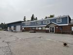 20,700+/- SF Retail/Warehouse Complex, 1.5+/- Acres Auction Photo