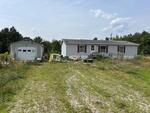 3BR Double Wide Home – 5.38+/- Acres Auction Photo