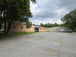 28,395+/-SF Mixed-Use Building – 2.25+/- Acres Auction Photo