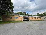 28,395+/-SF Mixed-Use Building – 2.25+/- Acres Auction Photo