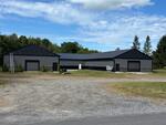15,816+/-SF New Construction Mixed-Use Building – 1.5+/- Acres Auction Photo