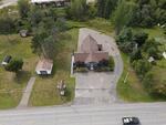 Complete Liquidation Of Cedar Log Home and Fence Manufacturing Facilities Auction Photo