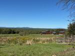 3BR New Englander Style Home – Mountain Views - .76+/- Acres Auction Photo