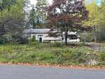 4BR Raised Ranch Home - .71+/- Acres Auction Photo