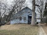 2BR Cape Home - Garage - .38+/- Acres Auction Photo