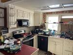 2BR Cape Home - Garage - .38+/- Acres Auction Photo