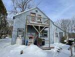 2BR Cape Home - Garage - .38+/- Acres Auction Photo