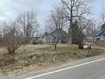2BR Cape Home - Garage - .38+/- Acres Auction Photo