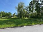 .69+/- Acre In Town Lot Auction Photo