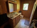 St Peter’s Country Store - (3) Homes - Apartment - Garages - 4.43+/-Acres Auction Photo