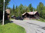 St Peter’s Country Store - (3) Homes - Apartment - Garages - 4.43+/-Acres Auction Photo