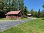 St Peter’s Country Store - (3) Homes - Apartment - Garages - 4.43+/-Acres Auction Photo