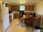 St Peter’s Country Store - (3) Homes - Apartment - Garages - 4.43+/-Acres Auction Photo