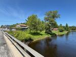 St Peter’s Country Store - (3) Homes - Apartment - Garages - 4.43+/-Acres Auction Photo