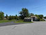 St Peter’s Country Store - (3) Homes - Apartment - Garages - 4.43+/-Acres Auction Photo