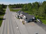 St Peter’s Country Store - (3) Homes - Apartment - Garages - 4.43+/-Acres Auction Photo