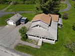 St Peter’s Country Store - (3) Homes - Apartment - Garages - 4.43+/-Acres Auction Photo