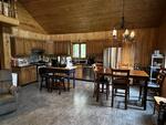 St Peter’s Country Store - (3) Homes - Apartment - Garages - 4.43+/-Acres Auction Photo