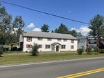 9-Unit Lodging Complex, 7,072+/-SF - 1.89+/- Acres Akers Pond Inn and Cabins Auction Photo