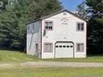 9-Unit Lodging Complex, 7,072+/-SF - 1.89+/- Acres Akers Pond Inn and Cabins Auction Photo