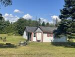 9-Unit Lodging Complex, 7,072+/-SF - 1.89+/- Acres Akers Pond Inn and Cabins Auction Photo