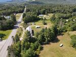9-Unit Lodging Complex, 7,072+/-SF - 1.89+/- Acres Akers Pond Inn and Cabins Auction Photo