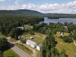 9-Unit Lodging Complex, 7,072+/-SF - 1.89+/- Acres Akers Pond Inn and Cabins Auction Photo