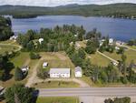 9-Unit Lodging Complex, 7,072+/-SF - 1.89+/- Acres Akers Pond Inn and Cabins Auction Photo