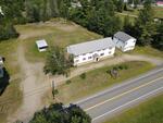 9-Unit Lodging Complex, 7,072+/-SF - 1.89+/- Acres Akers Pond Inn and Cabins Auction Photo
