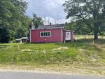 2BR Cottage - .73+/- Acres Auction Photo