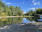 2BR Home - Crystal Lake - 220'+/- Shore Frontage Auction Photo