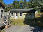 ABSOLUTE Single Wide Mobile Home  Garage - 1.5+/- Acres Auction Photo