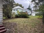 3BR Cape Style Home .11+/- Acres Auction Photo