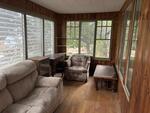 3BR Cape Style Home .11+/- Acres Auction Photo