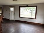 3BR Cape Style Home  1.1+/- Acres Auction Photo