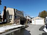3BR/3BA Gambrel Home - 1,838+/-SF - Garages Auction Photo