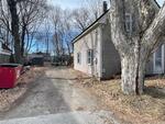3BR Cape Style Home - .10+/- Acres  Auction Photo