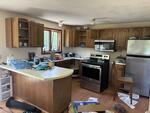 4BR Split Level Ranch - 5-Car Garage - 2.11+/- Acres Auction Photo