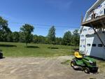 Gambrel Garage w/ 2BR 2nd Level Apt - 5.5+/- Acres  Auction Photo