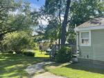 18-Unit Condominium Development - 3-Unit Commercial Building - (2) Homes - 14+/-AC Auction Photo