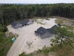 18-Unit Condominium Development - 3-Unit Commercial Building - (2) Homes - 14+/-AC Auction Photo