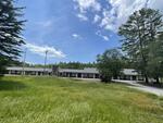 Mollyockett Motel & Swim Spa 20-Room Lodging Complex - Restaurant - Conference/Function Room Auction Photo